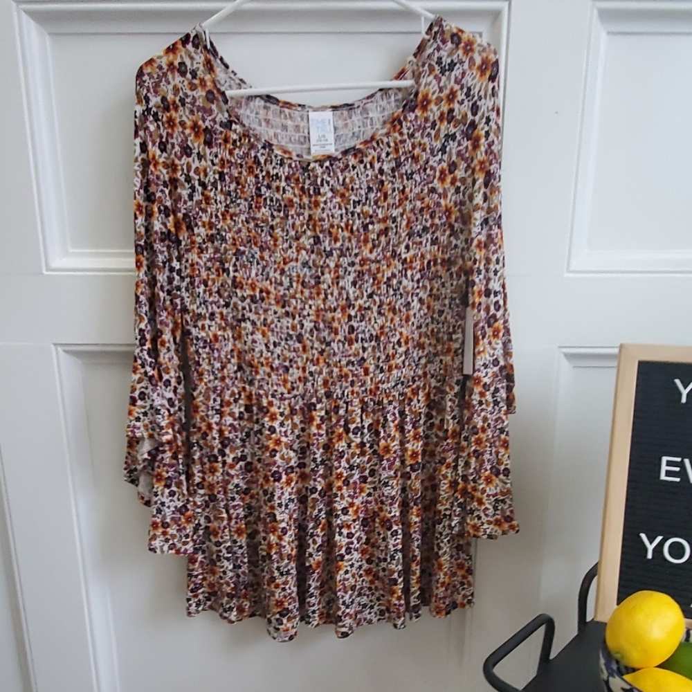 Floral print top with bell sleeves